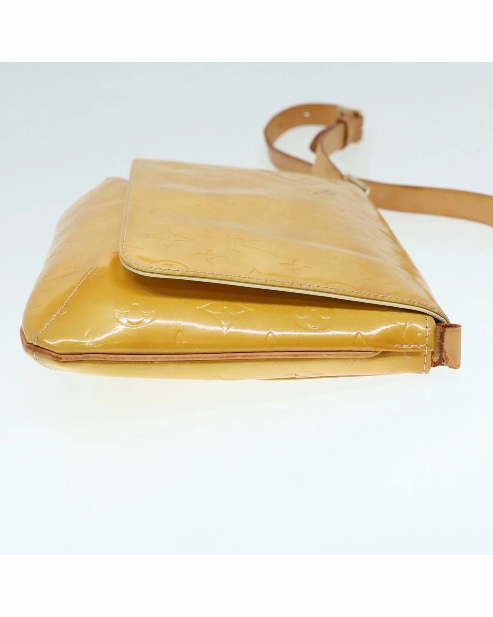 Pochette M90076 crossbody bag