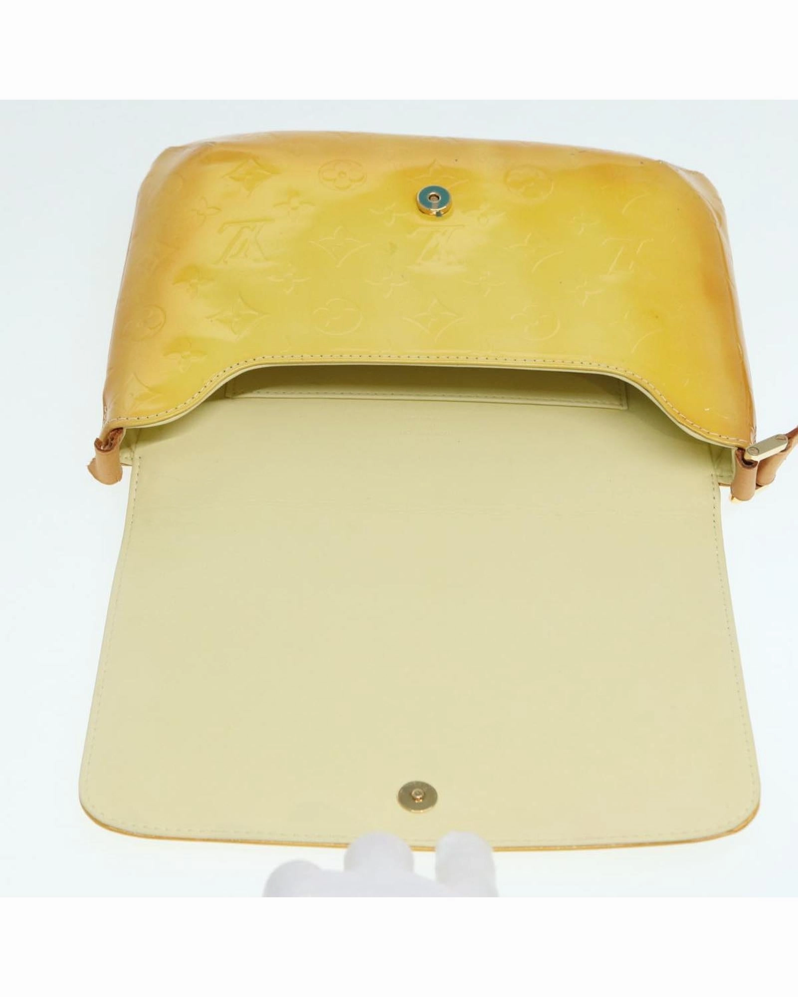 Pochette M90076 crossbody bag