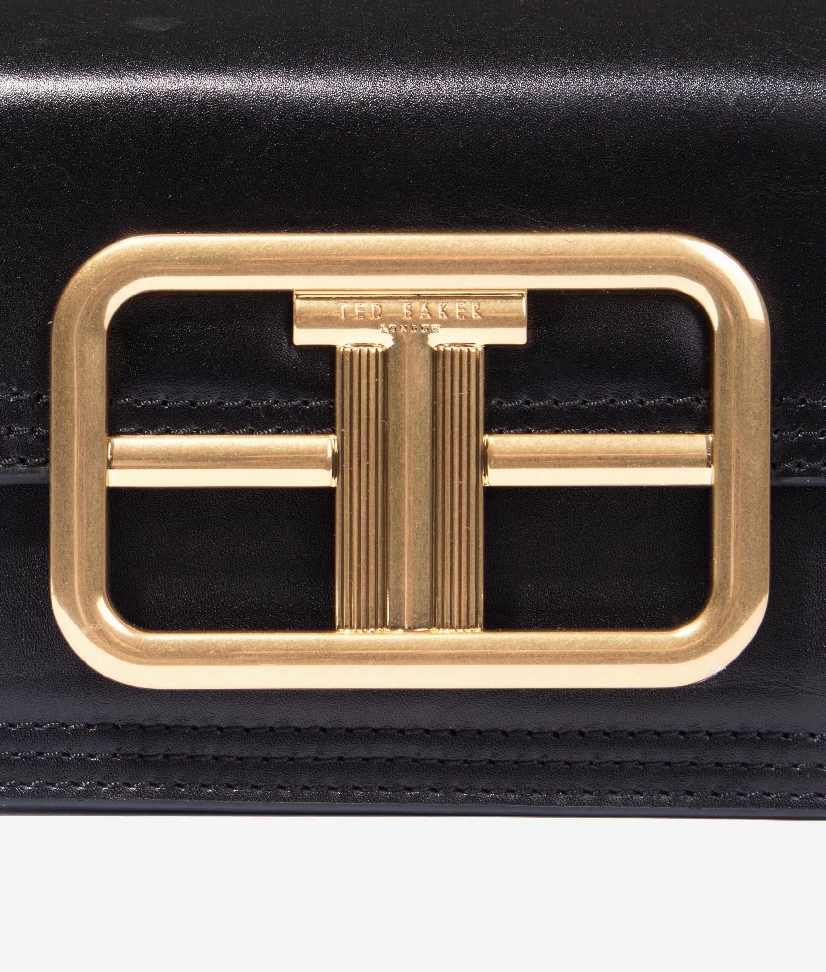 Tikisha bold statement mini crossbody in black